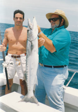 Barracuda and fishermen